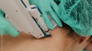 The mesotherapy procedure in process. Beautician doing injection with mesotherapy gun against aging for women. Injects into neck. Skin care.
