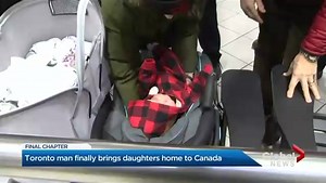 Canadian surrogate father brings twin girls home