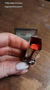 A Makeup Treasure from my vintage makeup collection. This is an Italian Art Deco Lipstick Case with a tiny mirror and it has the Lipstick still there. It's a bright orange red lipstick. Video credit on respect: mercedes_hayward_makeup #1930s #1930slipstick | Art Deco Lovers