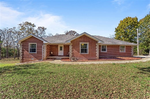 PENDING: - 371 CR 1434, Mountain Home, AR 72653 Enjoy the perfect blend of privacy and convenience with this beautiful 3-bedroom, 2-bath all-brick home built in 2002, sitting on 15 peaceful acres surrounded by woods yet offering a spacious, open yard. This well-kept country retreat features comfortable living spaces filled with natural light, along with a detached shop and mini garage ideal for projects, storage, or hobbies. You’ll love the quiet country setting while still being close to everyd