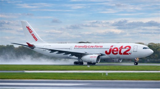 Aircraft taking off on a wet runway
