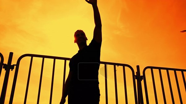 silhouette of a man waving with his arm Stock Video Footage - Alamy