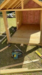 Working in dog house insulation #diy #carpentry #woodworking #doghouse