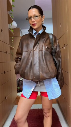 marissa on Instagram: "just a little obsessed with the way the mini skirt looks layered over the bike shorts 🫶🏼 shirt and tie thrifted skirt @mpazstudio shorts @arketofficial jacket @andros_seoul glasses @flatlisteyewear shoes @tonybianco @maccosmeticsanz lipstick in Russian red some pieces gifted"