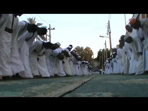 Sammani Sufi Hadra in Sudan (Fully Translated) – Dhikr of Breaths – ركائبُ القومِ – ذكر الانفاس