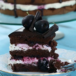 190K views · 14K reactions | Black Forest Cake is made with layers of chocolate sponge cake filled with whipped cream and kirsch soaked cherries, decorated with chocolate and more cherries. Full recipe:https://bit.ly/2x2smQW | Home Cooking Adventure | Facebook