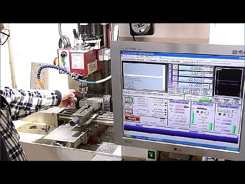 CNC mini metal milling machine making aluminum router work clamps