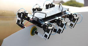 Robot crawls across wind turbine in world-first off-shore "blade walk"
