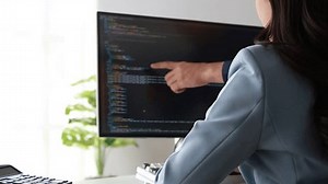 Group of programmers brainstorm together to write programs on the computer, designing programs to meet the needs of users and friendly users, designing programs to help manage work. Programmer concept