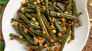 Asian Style Sweet & Spicy Green Beans Recipe ticks all the boxes of a fresh, tasty, tangy, sweet & spicy Asian flavours and textures. A easy and delicious side to make for your next Asian party dinner or lunch. Recipe Link - https://www.archanaskitchen.com/asian-style-spicy-green-beans-recipe | Archana's Kitchen