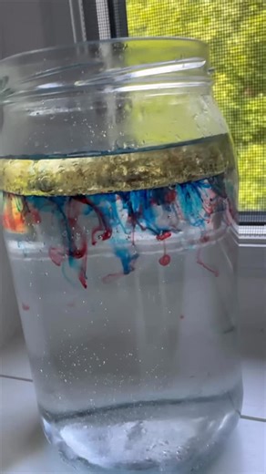 Mandisa | Happy Toddler Playtime on Instagram: "This classic science activity never gets old! Watch colorful “fireworks” burst and swirl inside a jar as oil and food coloring mix with water. It’s simple, mesmerizing, and such a fun way to explore color mixing and basic science—without any loud bangs. Perfect for New Year’s Eve or anytime kids want a little wow-factor science. Comment FIREWORKS and I’ll send you this experiment + more easy New Years Eve STEM activities kids will enjoy! 🎆🧪"