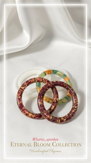 Resin Gallery on Instagram: "Nature preserved forever 💐✨ Handcrafted Resin Bangles made with real dried flowers by Suma Sparkes – Resin Artist of Karimnagar. Each bangle is unique, timeless, and made with love 🤍 Looking for custom resin bangles in Karimnagar? You’ve found the best resin artist & top resin art studio in Karimnagar 🌸 📩 DM for custom orders & gifting #resinbangles #driedflowerjewellery #resinjewelleryindia #sumasparkes #ResinArtistKarimnagar"