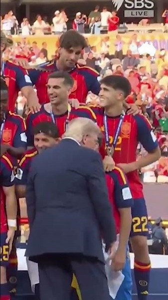 Donald Trump booed after refusing to leave stage during Spain's World Cup trophy presentation