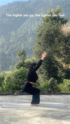 Utkatasana with the mountains #shorts #yogajourney #chairpose #yoga #outdooryoga #youtubeshorts