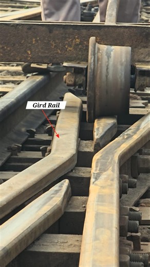 Guard rail helps guide the train wheels and improves safety on bridges and curves. #railtrack