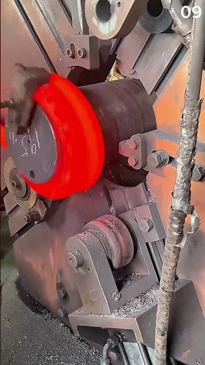 The process of forming hot iron rods with a rotary machine