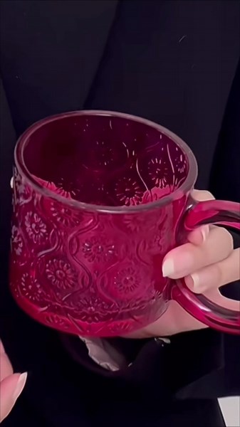 Bring bold elegance to your drinkware collection with this vibrant ruby glass mug. Its intricate floral design and striking color make it perfect for adding a pop of luxury to your coffee or tea time. #RubyGlassMug #FloralGlassMug #ElegantDrinkware #BoldDesign #LuxuryMug #CoffeeLovers #TeaTimeEssentials #StylishMugs