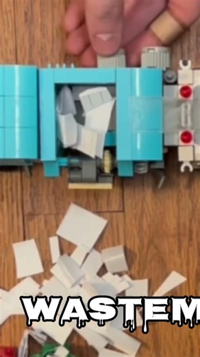 Blue LEGO Garbage truck compacting paper #lego #garbagetrucks #fyp #paper #compactor #satisfying