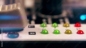 Sound engineer using main control fader of studio mixer. Stock Video