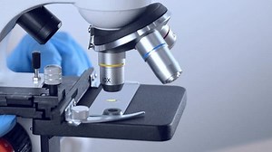 Scientist using microscope for study research in science laboratory. Doctor using medicine microscope in the clinical laboratory.