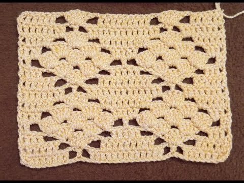 “Crochet pattern with repeating fans”