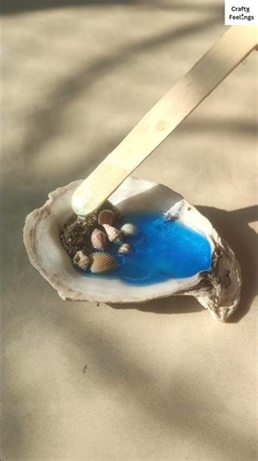 Resin ocean art in a seashell 🌊 | Beach resin art tutorial | Using real sand and seashells #shorts