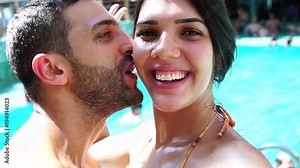 Couple Taking a Selfie on Swimming Pool