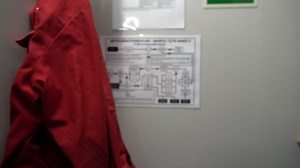 Marpol garbage management plan on wall in engine room staircase of ship - poster showing international rules of garbage handling and what can be disposed to sea - focus pull Premium Stock Video Footage