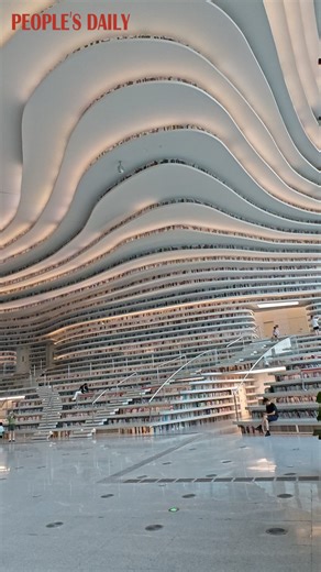 30K views · 3.8K reactions | Beyond its stunning design, north China's Tianjin Binhai Library is a place where you can take a break, read a book and get lost in endless stories. | People's Daily, China | Facebook