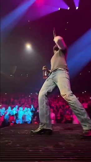 Shaboozey performs "A Bar Song (Tipsy)" in concert
