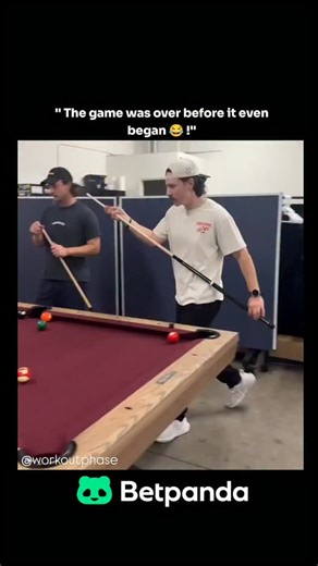 WorkOut Phase on Instagram: "The post features a 23-second video clip of two young men playing pool in a casual warehouse setting, where an attempted trick shot causes the cue ball to ricochet wildly, instantly pocketing multiple balls and ending the game in chaos, eliciting laughter from the players. Posted by @awkwardgoogle , an account curating viral internet clips, the video has garnered over 53,000 views and 351 likes within hours, with replies emphasizing the hilarity of the "cheat" and ph