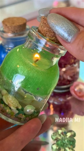 28K views · 2.8K reactions | Dive into cozy ASMR vibes with this green jelly wax water candle ✨ Crafted with hidden sea treasures. Double‑tap if you love satisfying DIYs! #asmr #diy #cozyvibes #candles #reels #candlemaking #handmade #craft . . . . . . . . . . . . . Water Candle, Jelly Wax, ASMR DIY, Satisfying Craft, Cozy Home Decor, Sea‑Inspired Candle, Relaxing Tutorial, Tiny Jar Candle, Handcrafted Magic, Nadiia Mi | Nadiia Mi | Facebook