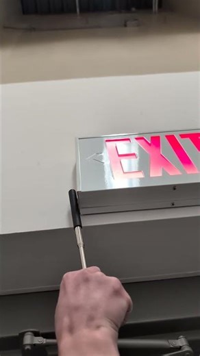 Testing a Sure-Lites SLX exit sign at Walgreens