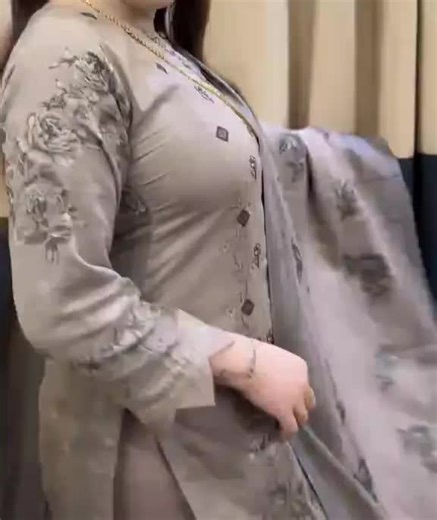 Traditional South Asian Outfit Showcase with Embroidery