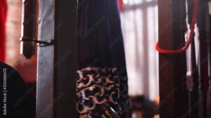 Selective focus of female legs climbing steps to go on platform and deliver speech during conference on women's day regarding empowerment and growth