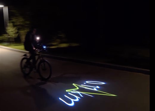 Bicycle-mounted GPS laser projector