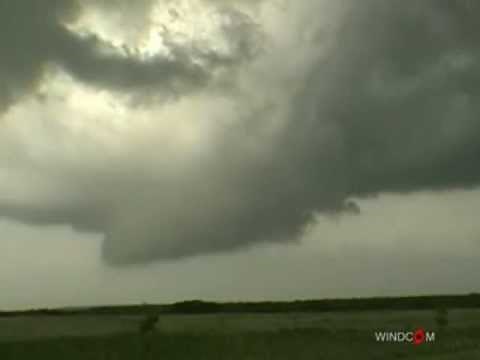 UFO caught heading into a tornado. Amazing footage!