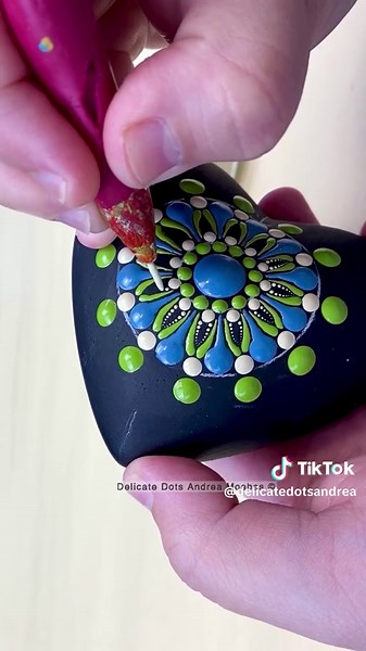 A new heart to add to the collection. Loving the blue, green, and cream color palette. I may have already started a few other pieces with these colors. 😉 🤗 #mandala #heart #dotart #oddlysatisfying #satisfyingart