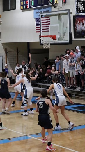 Exciting Female Basketball Game Highlights in a Gym