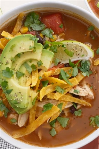 Give this chicken tortilla soup recipe a try and you’ll be craving it all season long! | Kim's Cravings
