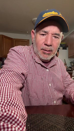 Enjoying a Refreshing Red Popsicle in the Kitchen