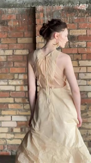 Delia is the dress you put on when the night really matters. From the front, Delia feels quietly minimal. From the back, it’s pure theatre: slender straps radiate across an open panel, framing the shoulder blades in a delicate lattice. Elegant, a little mysterious, and unmistakably modern. Would you wear Black or Natural? ——— #dogstarclothing #fashionbrand #btsphotoshoot #photoshoot #sustainablefashion #avantgardefashion #australianbrand #brisbanebased #independentfashiondesigner | dogstar