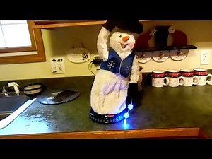 Gemmy Christmas Spinning Miser Snowflake Animated Singing Snowman