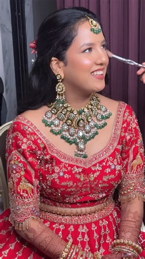 Meera Shah|Bridal Artist on Instagram: "When the red hits just right ❤️ Balanced glam, strong features, and a bridal look made to shine on every beat ✨ Mua: @meerashah_makeupartist Hair: @bhartishah_hairstylist Bride: @ishitagupta_96 Couple page: @thekrishivwedding [Red Bridal Look, Red Bride, Bridal Makeup, Indian Bridal Makeup, Traditional Bridal Glam, Glowing Bridal Skin, Bold Bridal Eyes, Timeless Bridal Look, Wedding Makeup, Bridal Glow, Heavy Bridal Makeup, Classic Red Bride, Bridal Makeup