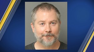 49-year-old Raleigh man charged with DWI after crashing into police car