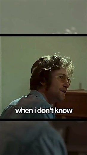 John Lennon showing George Harrison his unfinished song