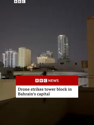 A drone has been filmed striking a tower block in Bahrain's capital, Manama. Apparent Iranian attacks have been reported across the Middle East, after the US and Israel launched attacks across the country. #Iran #Bahrain #News #BBCNews