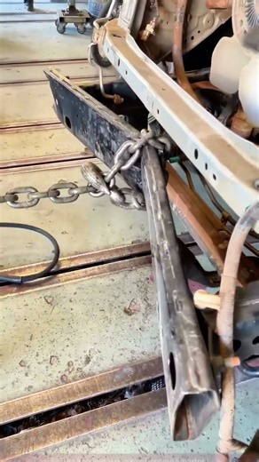 Auto Body Repair: Detail of Chain Fixation on Car Body Parts