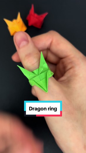 Replying to @mh.si_io.sono.io How to make origami dragon ring🐲 I’m not sure who’s the designer of this model, but I found it on @TLT Lab’s channel✌️ Song: Wake up by @Imagine Dragons #origami #tutorial #origamitutorial #owlrigami #origamiring #paperrings #dragonring #ring #LOOM