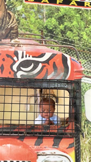 Baby looking guilty and locked up… charged with being too cute!😆